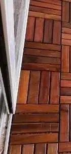 View of a wooden floor with a herringbone pattern