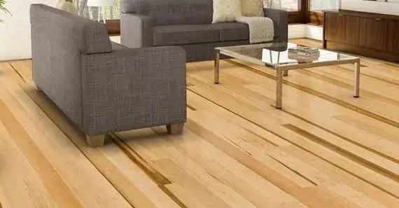 elegant hardwood flooring with contrasting light and dark wood stripes.